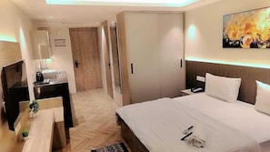 1 habitación, tabla de planchar con plancha, wifi y ropa de cama