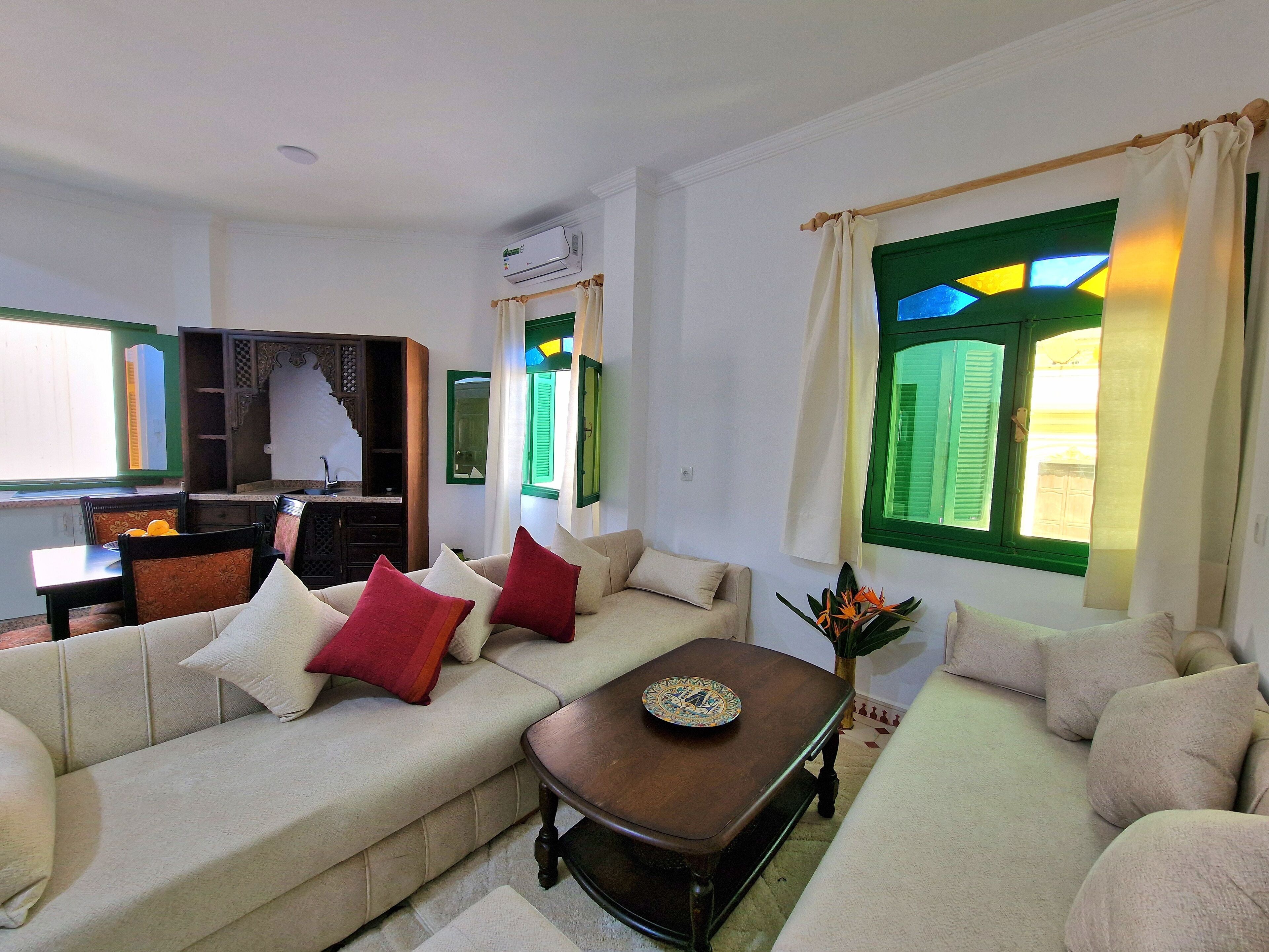 Classic Apartment | Living area | 30-inch Smart TV with satellite channels