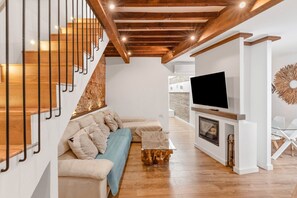 TV, fireplace - Village house, 100m from the beach, with Wi-Fi and air conditioning (Estepona)