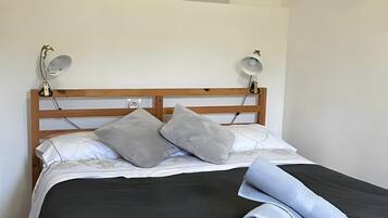2 dormitorios, tabla de planchar con plancha, wifi y ropa de cama