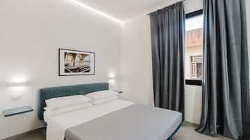 1 dormitorio, tabla de planchar con plancha, wifi y ropa de cama