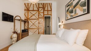 1 habitación, tabla de planchar con plancha y cuna de viaje 