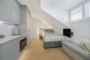 1 habitación, tabla de planchar con plancha, wifi gratis y ropa de cama 