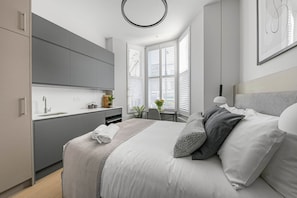 1 habitación, tabla de planchar con plancha, wifi gratis y ropa de cama