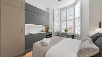 1 slaapkamer, een strijkplank/strijkijzer, gratis wifi, beddengoed