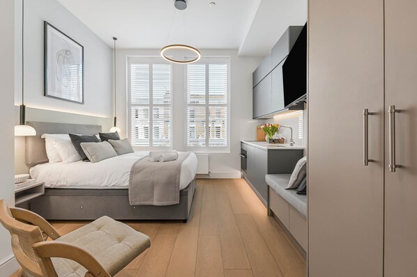 1 habitación, tabla de planchar con plancha, wifi gratis y ropa de cama