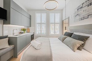 1 غرفة نوم ومكواة/لوح كي وواي فاي مجانًا وملاءات أسرّة