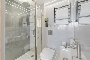 Shower, hair dryer, towels, soap