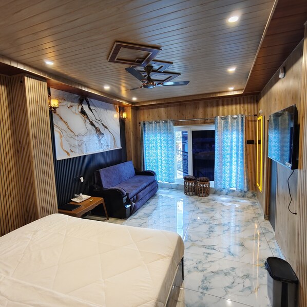 Quarto casal superluxo, vista para a montanha | Lounge executivo