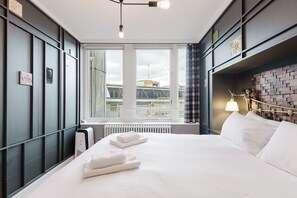 1 dormitorio, tabla de planchar con plancha, Internet y ropa de cama