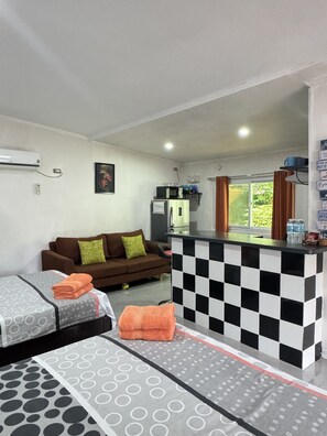 Comfort Cottage, Multiple Beds, Pool Access, Garden View | Living area - Bamboo Orange Cabana and Studio (Binalonan)
