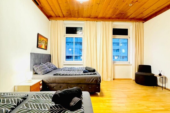 1 bedroom, desk, bed sheets