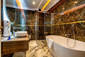 Luxury Double Room, Balcony, Courtyard View | Bathroom | Separate tub and shower, free toiletries, hair dryer, towels