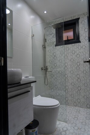 Shower, towels, soap, shampoo