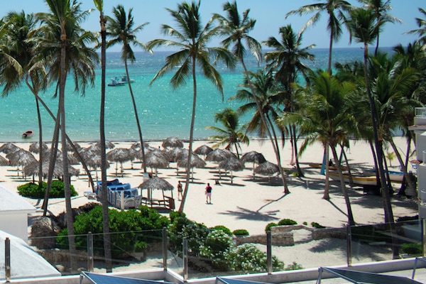 Private beach, white sand, beach cabanas, beach massages