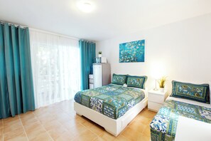 Basic Studio, Balcony, Pool View | In-room safe, laptop workspace, blackout curtains, iron/ironing board