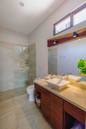 Shower, hair dryer, towels, soap
