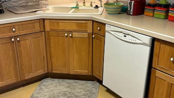 Fridge, microwave, toaster, cleaning supplies