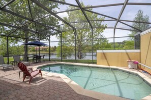 A heated pool - EV_3169 - 4 Bed 3.5 Bath Townhome with Screened-In Private Pool (Kissimmee)