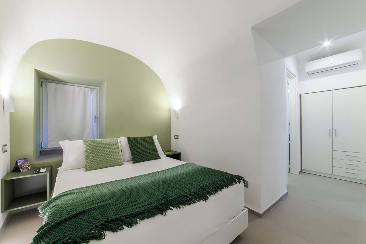 Superior Apartment | Minibar (some free items), laptop workspace, blackout drapes