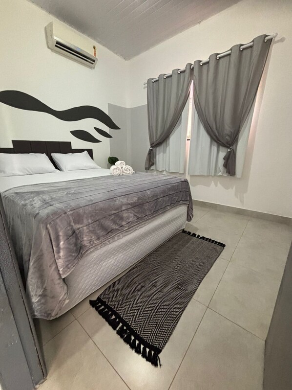 1 habitación, tabla de planchar con plancha, wifi y ropa de cama 