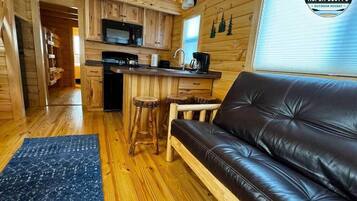 Cabaña familiar | Área de sala de estar