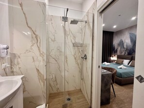 Deluxe Room, City View | Bathroom | Shower, hair dryer, towels, soap