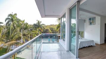 Deluxe Quadruple Room, Balcony | Blackout drapes, iron/ironing board, free WiFi