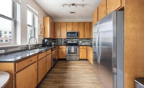Fridge, dining tables - Landing | Incredible 1BD, Pool, Gym (Denver)