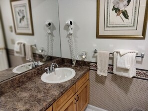 Hair dryer, towels, soap, toilet paper