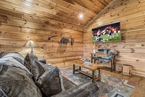 Smart-TV, Kamin, Videospiele, Bücher