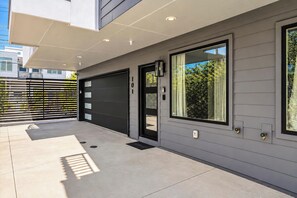 Unload at your own front door with the garage right beside it. Private entry, no lobby, no elevator.