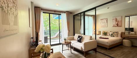 Superior Studio Suite, Pool View | In-room safe, desk, laptop workspace