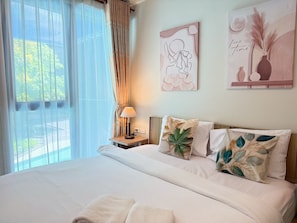 Superior Studio Suite, Pool View | In-room safe, desk, laptop workspace