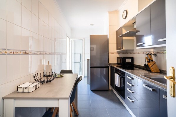 Fridge, microwave, oven, dishwasher