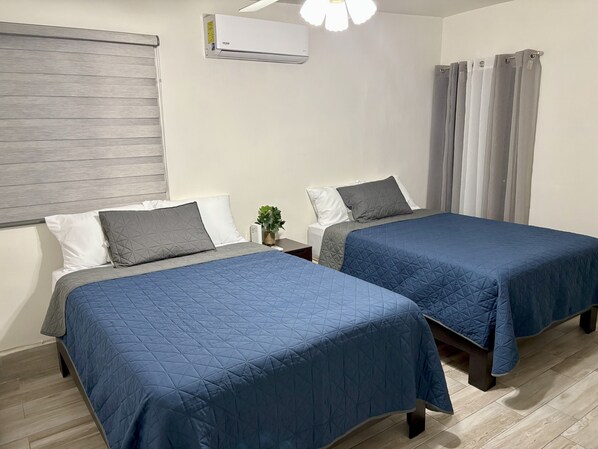 2 dormitorios, tabla de planchar con plancha, wifi y ropa de cama