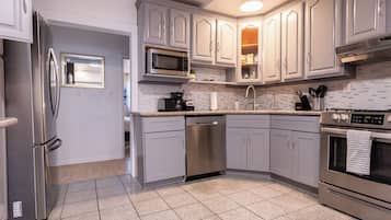 Microwave, oven, dining tables