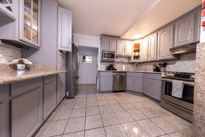 Microwave, oven, dining tables
