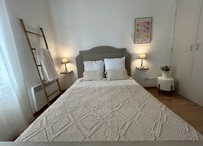 2 dormitorios, tabla de planchar con plancha, wifi y ropa de cama
