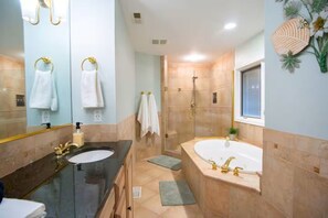 Shower, jetted tub, hair dryer, towels