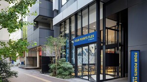 A modern building with a glass facade and a sign reading "FOUR POINTS FLEX BY SHERATON". - Four Points Flex By Sheraton Tokyo Shibuya West (Tokyo)
