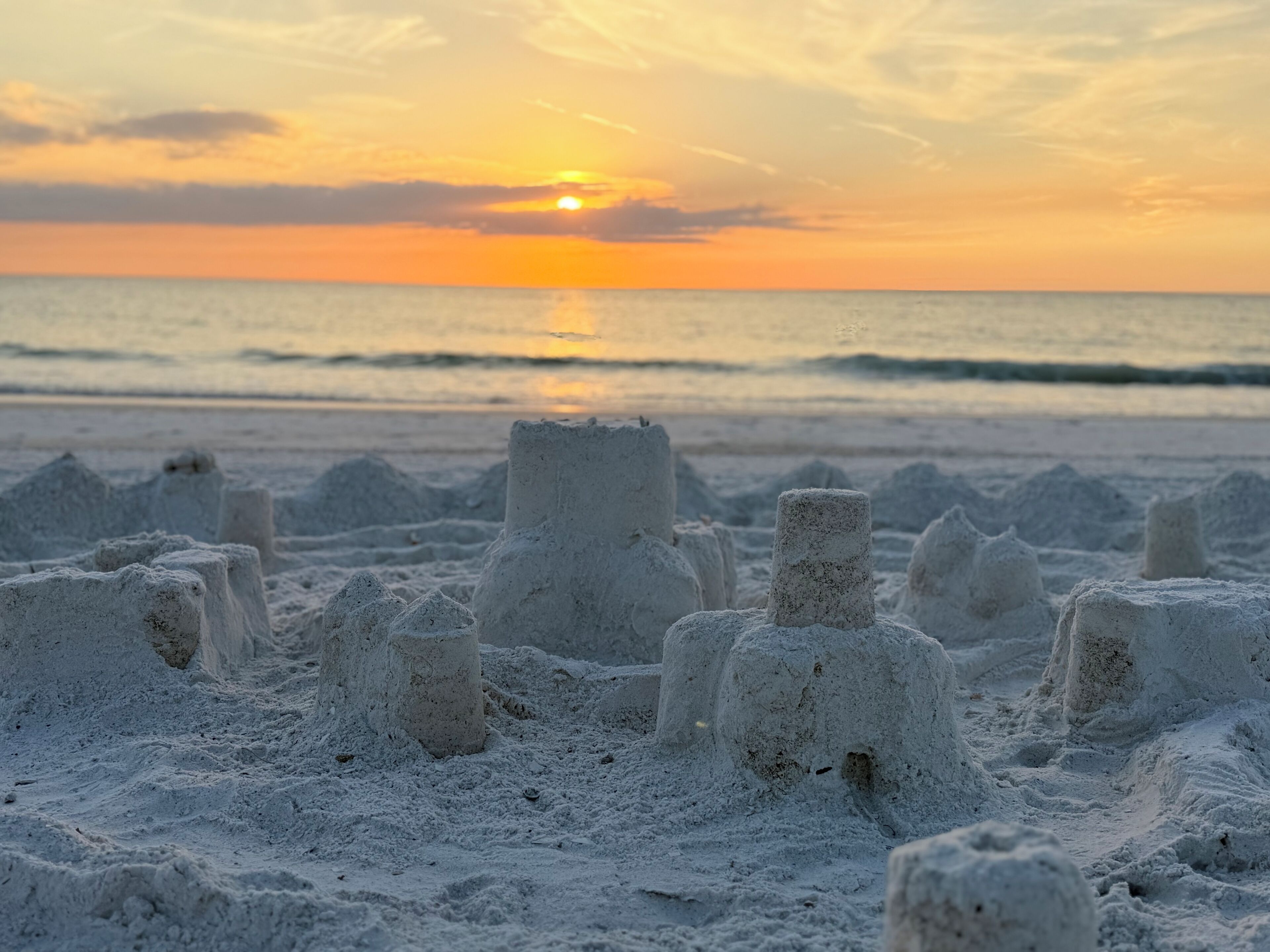 On the beach, sun loungers, beach towels