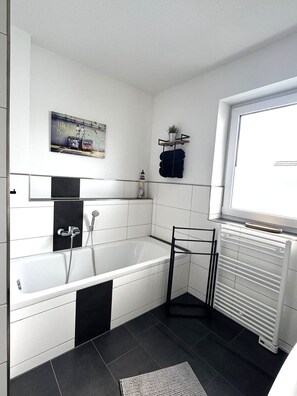 Shower, hair dryer, towels