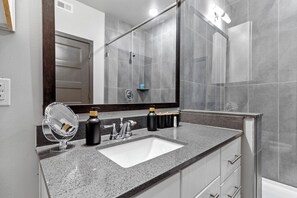 Hair dryer, towels, soap, toilet paper