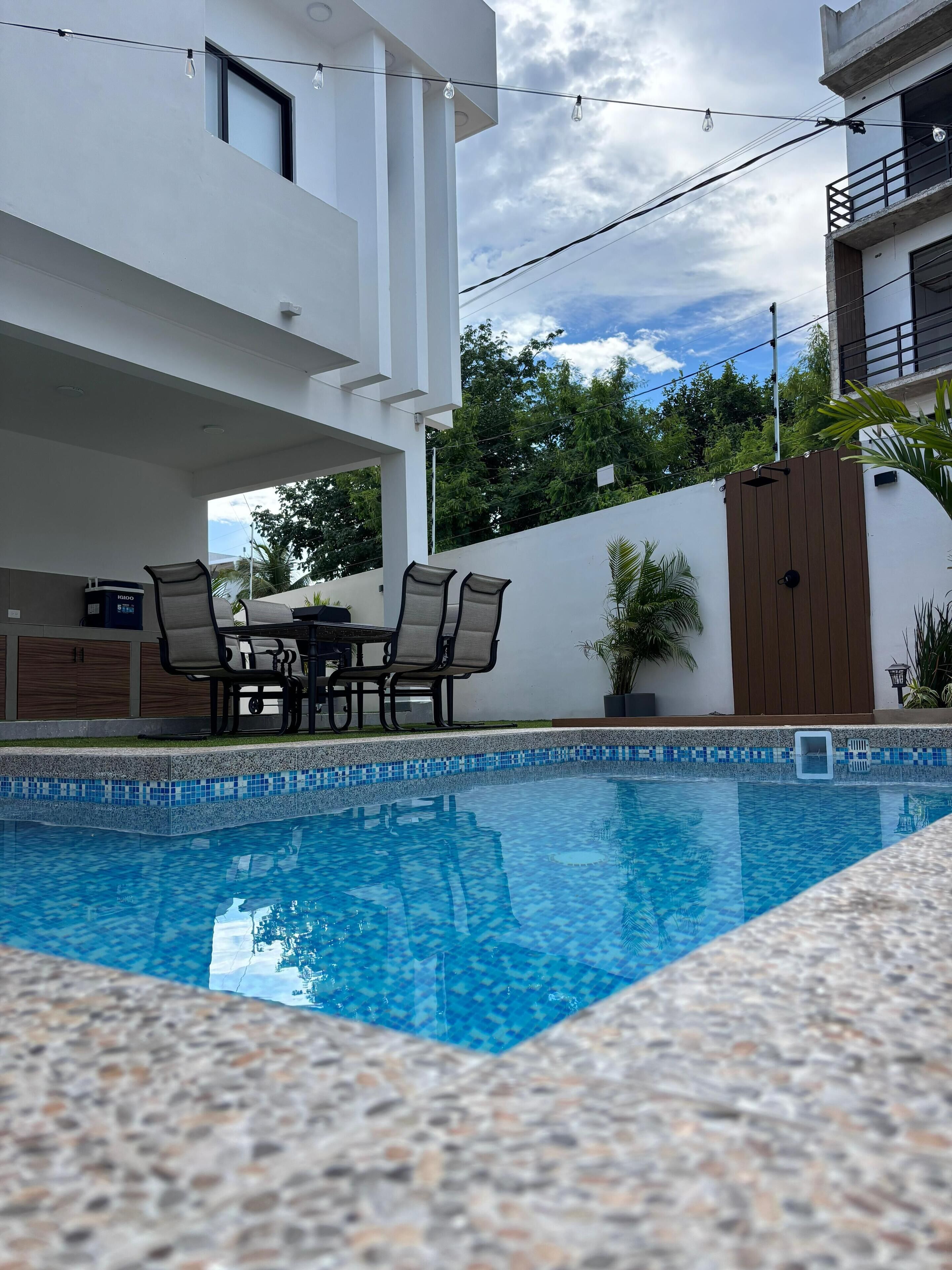 Outdoor pool, open 7:00 AM to 9:00 PM, pool umbrellas, pool loungers