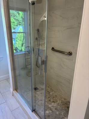 Shower, hair dryer, towels