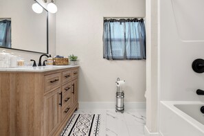 Hair dryer, towels, soap, toilet paper