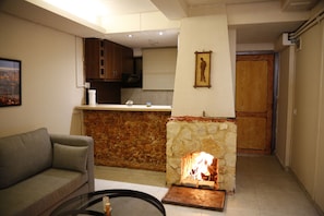 Comfort Chalet, 1 Bedroom, Mountain View | Living area | Flat-screen TV