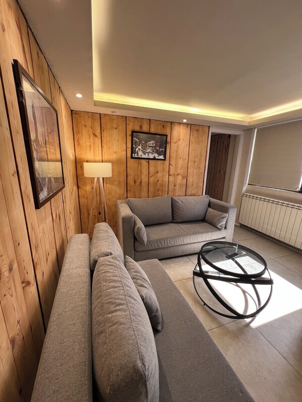 Comfort Chalet, 2 Bedrooms, Mountain View | Living area | Flat-screen TV