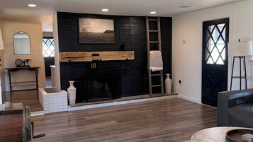 Smart TV, fireplace, books